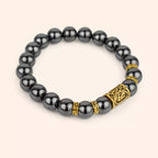 Bracelet en Pierres Naturelles Hématite et Perle Rune Viking Dorée  Bracelet Jethyka