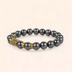 Bracelet en Pierres Naturelles Hématite et Perle Rune Viking Dorée  Bracelet Jethyka