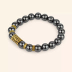 Bracelet en Pierres Naturelles Hématite et Perle Rune Viking Dorée  Bracelet Jethyka