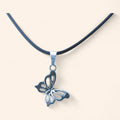 Pendentif papillon argenté chaîne et cordon noir  Pendentif Jethyka
