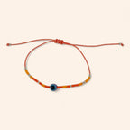 Bracelet Perles Rocailles Oranges et Œil Protecteur  Bracelet Jethyka