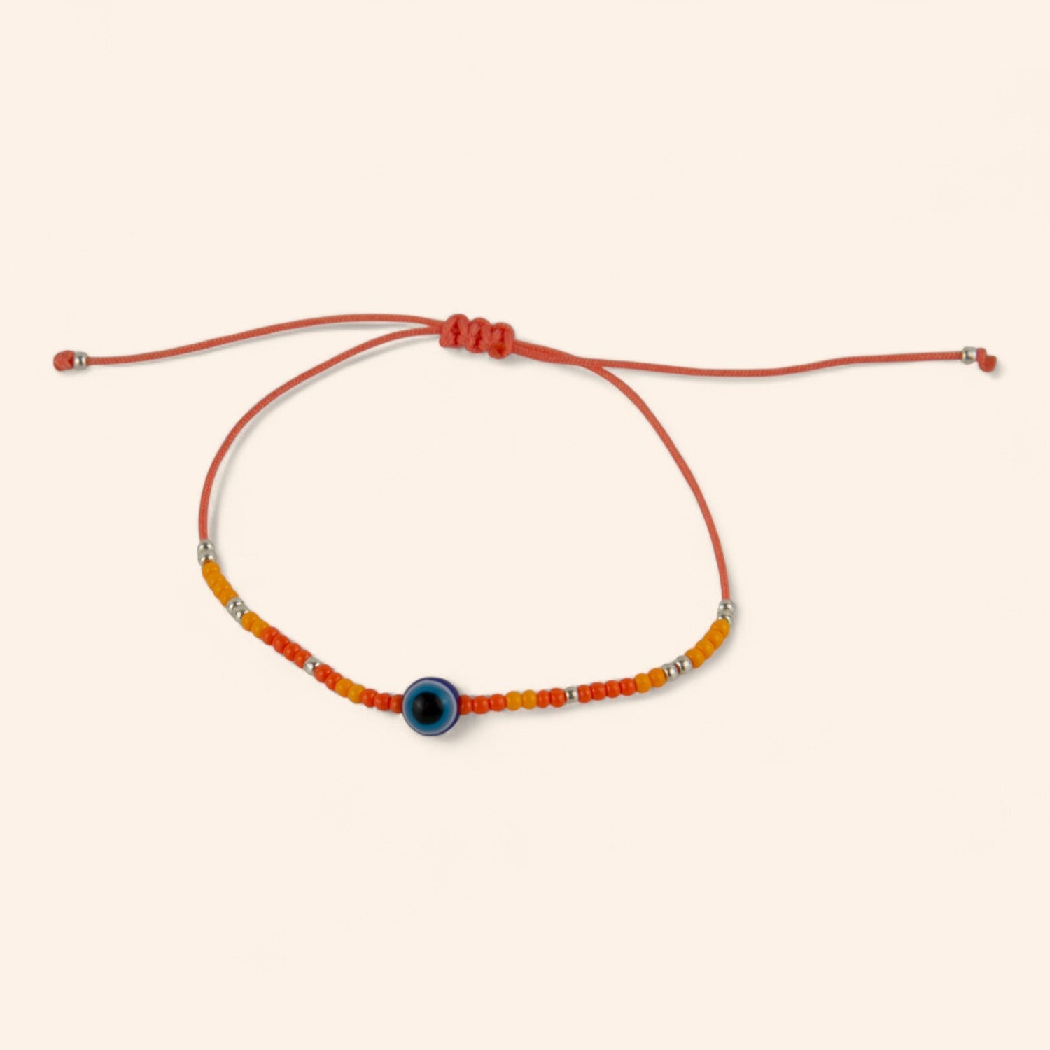 Bracelet Perles Rocailles Oranges et Œil Protecteur  Bracelet Jethyka