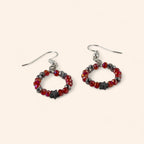 Boucles étoile hématite et perles cristal rouges  Boucles d'Oreilles Jethyka