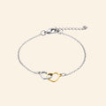 Bracelet Cœur entrelacés bicolore chaîne argentée