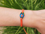 Bracelet macramé orange avec coquillage cauri coloré  Bracelet Jethyka