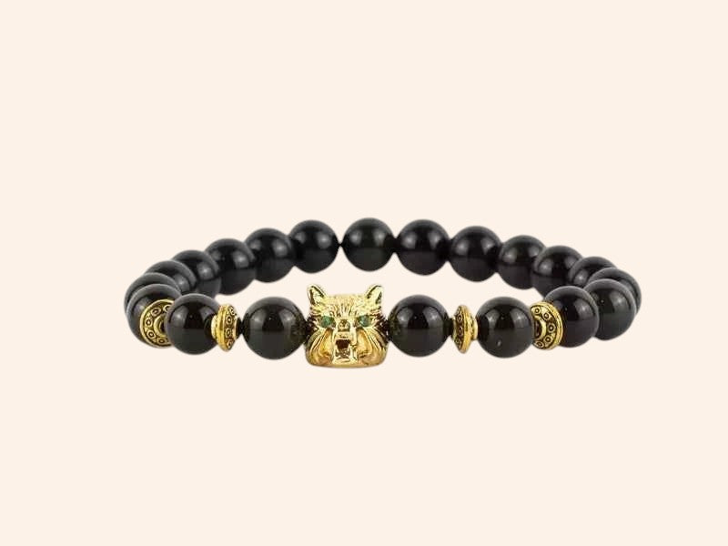 Bracelet en pierres naturelles Obsidienne et perle Loup en métal doré – Bijou puissant et protecteur