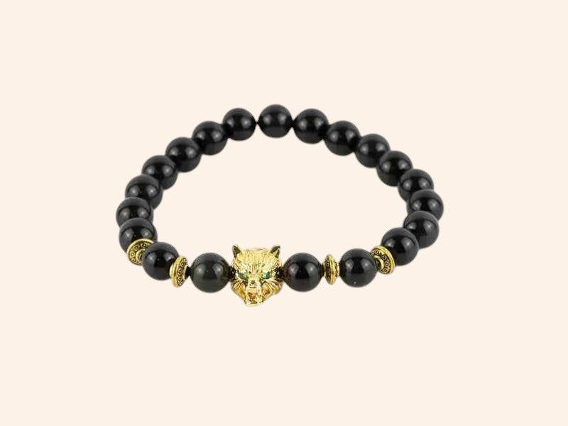 Bracelet en pierres naturelles Obsidienne et perle Loup en métal doré – Bijou puissant et protecteur
