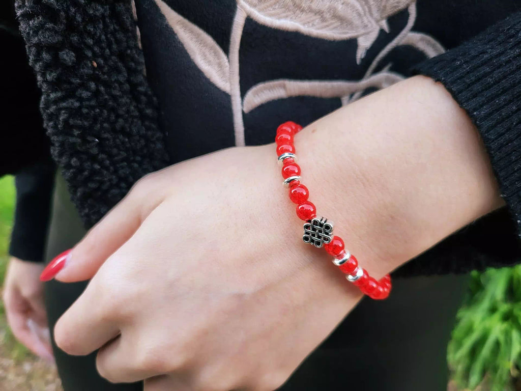 Bracelet Perles de Verre Rouges et Perle Nœud Celtique Jethyka Bracelet Jethyka