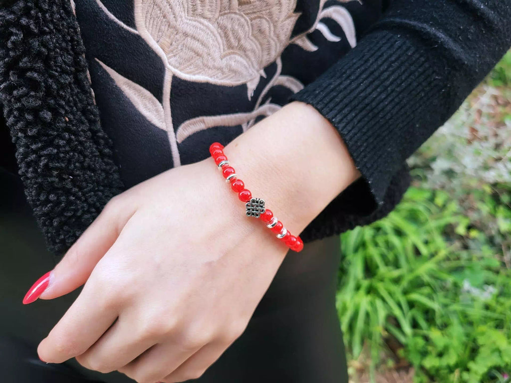 Bracelet Perles de Verre Rouges et Perle Nœud Celtique Jethyka Bracelet Jethyka