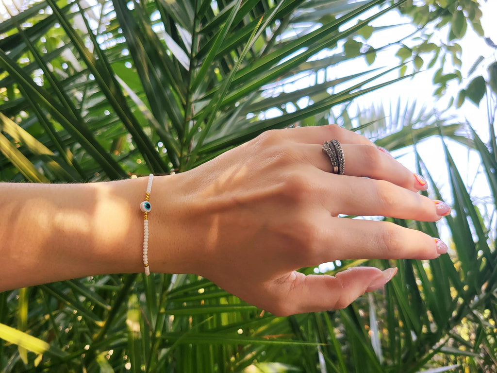 Bracelet Perles Rocailles Blanches et Dorées avec Œil Protecteur  Bracelet Jethyka