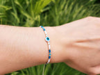 Bracelet Perles Rocailles Bleues et Blanches avec Œil Protecteur – Bijou Talisman Porte-Bonheur  Bracelet Jethyka