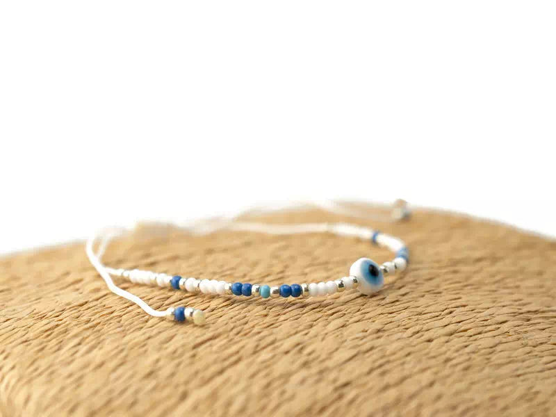Bracelet Perles Rocailles Bleues et Blanches avec Œil Protecteur – Bijou Talisman Porte-Bonheur  Bracelet Jethyka