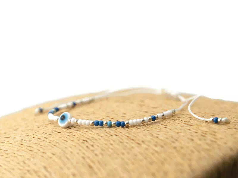 Bracelet Perles Rocailles Bleues et Blanches avec Œil Protecteur – Bijou Talisman Porte-Bonheur  Bracelet Jethyka