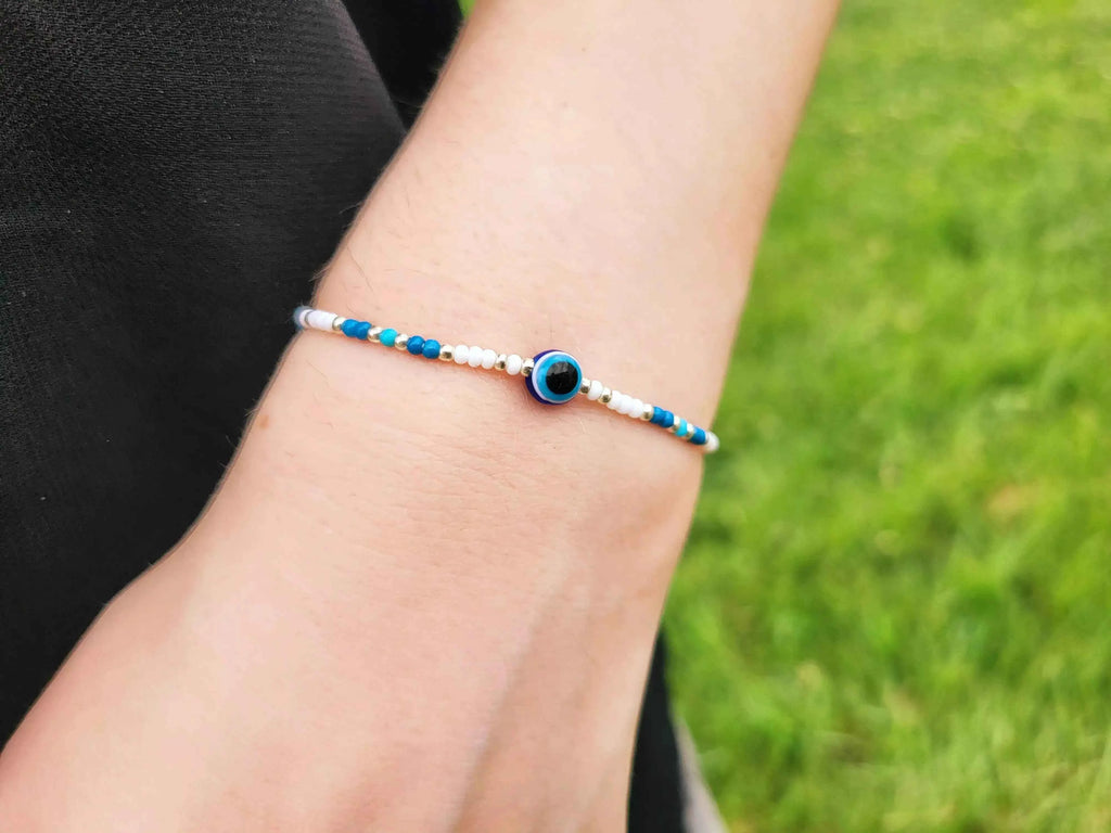 Bracelet Œil Protecteur perles rocailles blanches et bleues