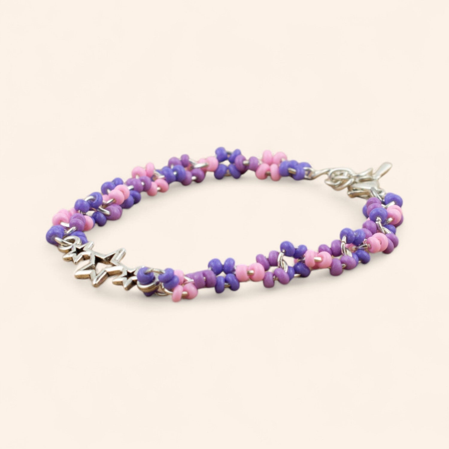 Bracelet en perles rocailles camaïeu violet et étoiles en métal argenté  Bracelet Jethyka