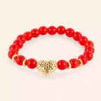 Bracelet en perles de verre craquelé rouge et cœur doré  Bracelet Jethyka