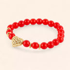Bracelet en perles de verre craquelé rouge et cœur doré  Bracelet Jethyka