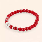 Bracelet perles verre craquelé rouge et Fleur de Cerisier  Bracelet Jethyka