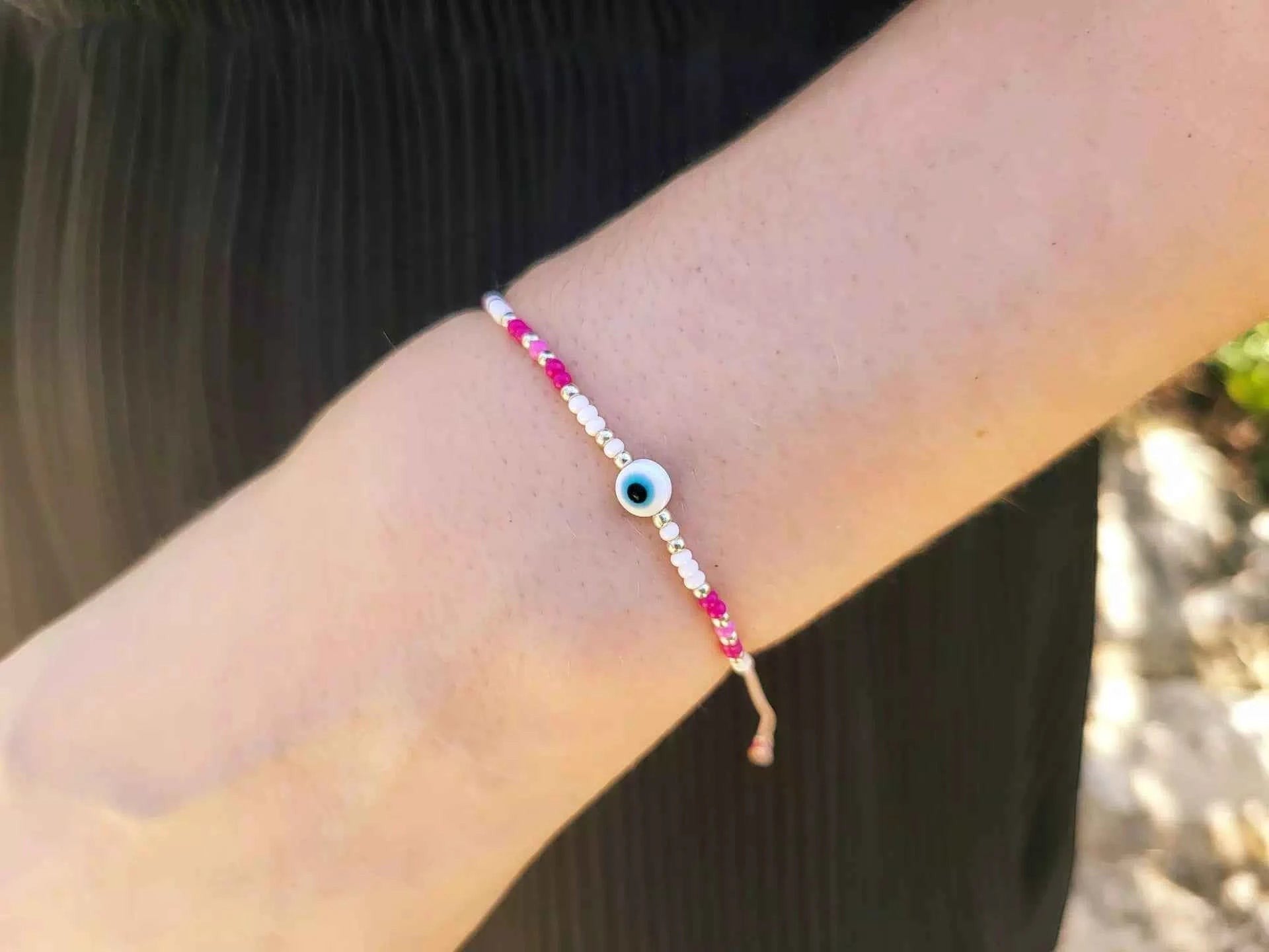 Bracelet Œil protecteur perles rocailles roses et blanches