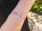 Bracelet Œil protecteur blanc perles rocailles roses et blanches  Bracelet Jethyka