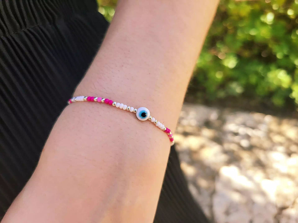 Bracelet Œil protecteur blanc perles rocailles roses et blanches  Bracelet Jethyka
