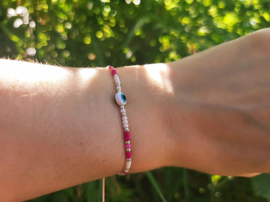 Bracelet Œil protecteur blanc perles rocailles roses et blanches  Bracelet Jethyka