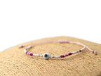 Bracelet Œil protecteur perles rocailles roses et blanches