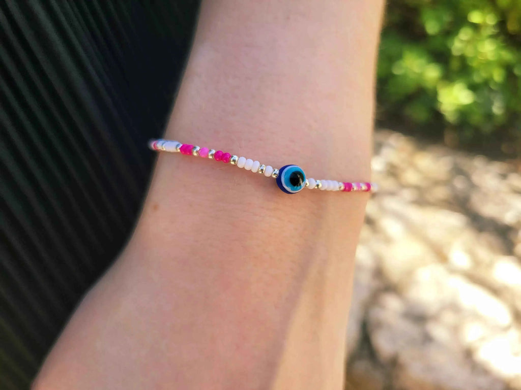 Bracelet Œil Protecteur perles rocailles blanches et roses