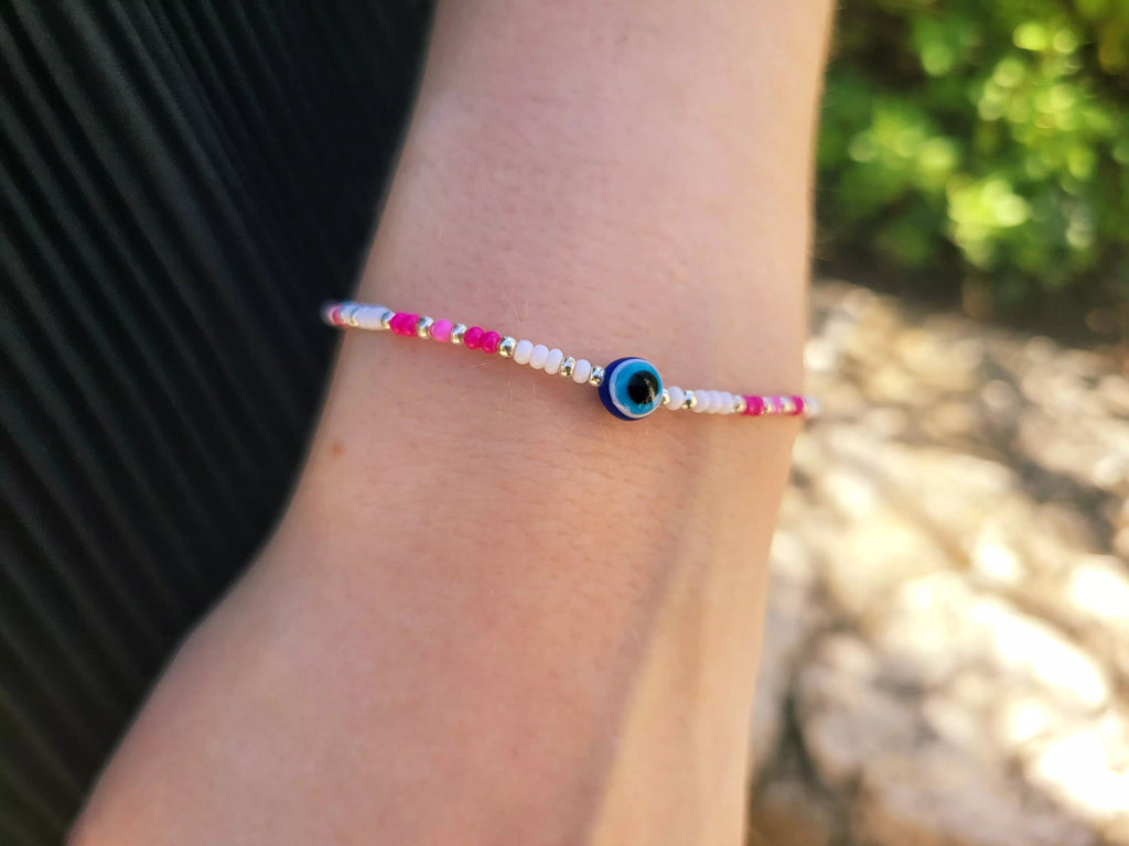 Bracelet en Perles Rocailles Blanches et Roses avec Perle Œil Protecteur  Bracelet Jethyka