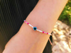 Bracelet Œil Protecteur perles rocailles blanches et roses