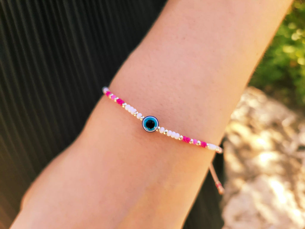 Bracelet en Perles Rocailles Blanches et Roses avec Perle Œil Protecteur  Bracelet Jethyka