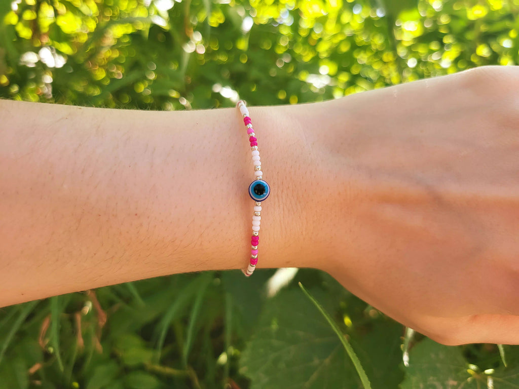 Bracelet en Perles Rocailles Blanches et Roses avec Perle Œil Protecteur  Bracelet Jethyka