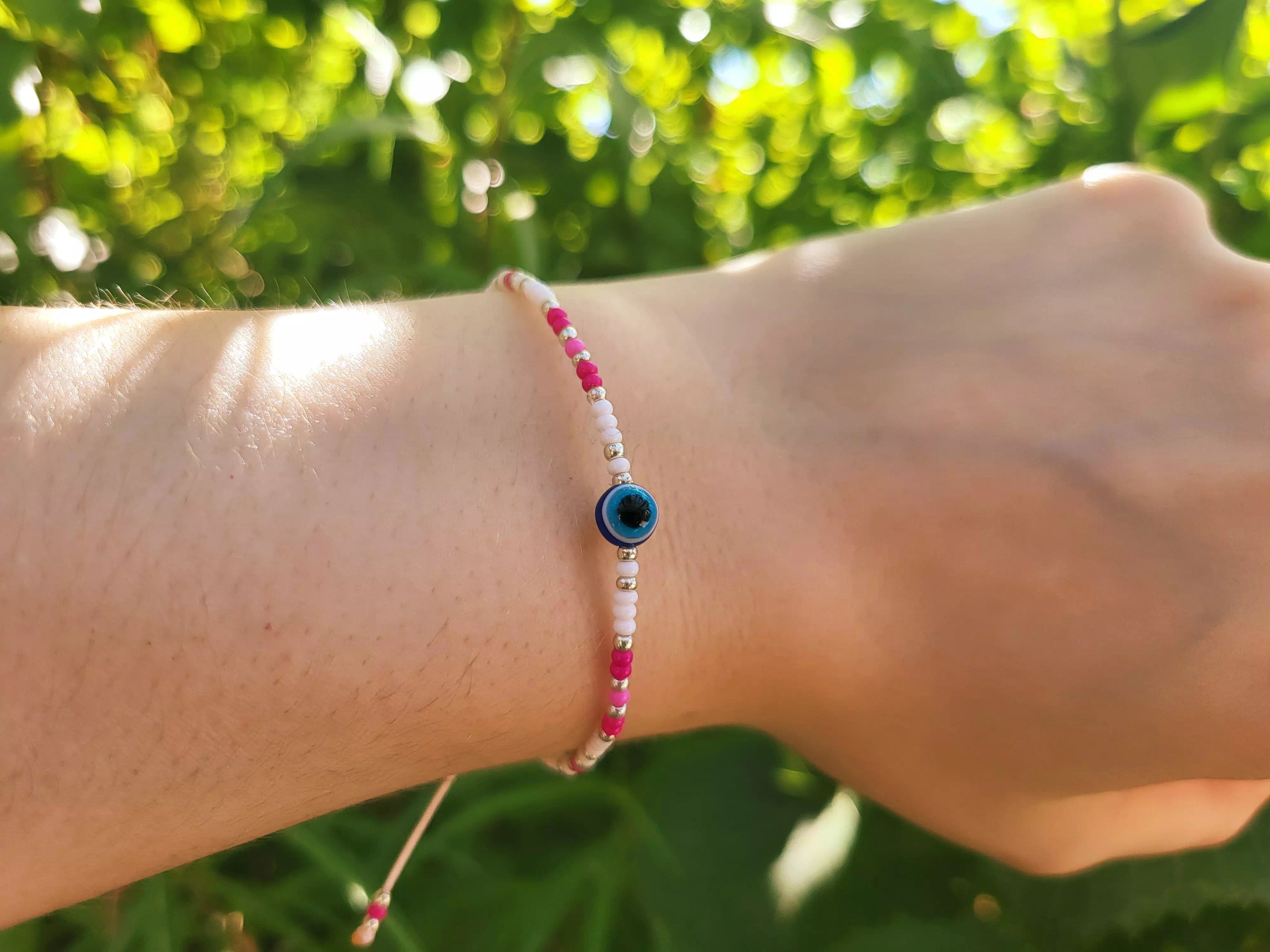 Bracelet en Perles Rocailles Blanches et Roses avec Perle Œil Protecteur  Bracelet Jethyka