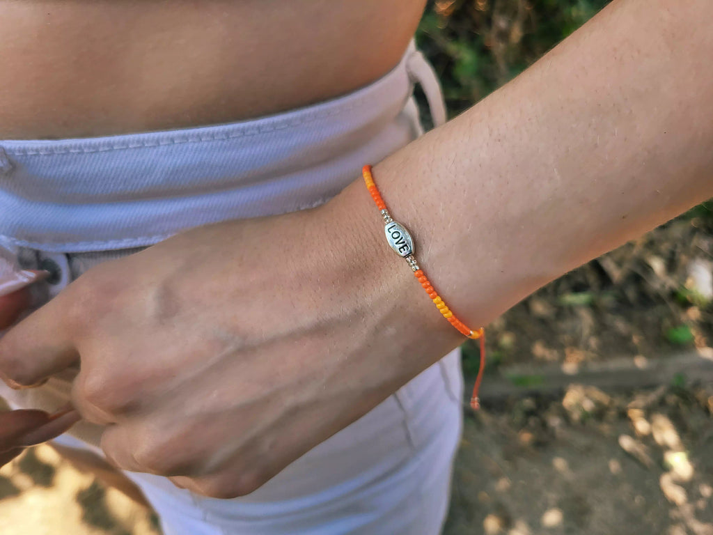 Bracelet Love perles rocailles orange  Bracelet Jethyka