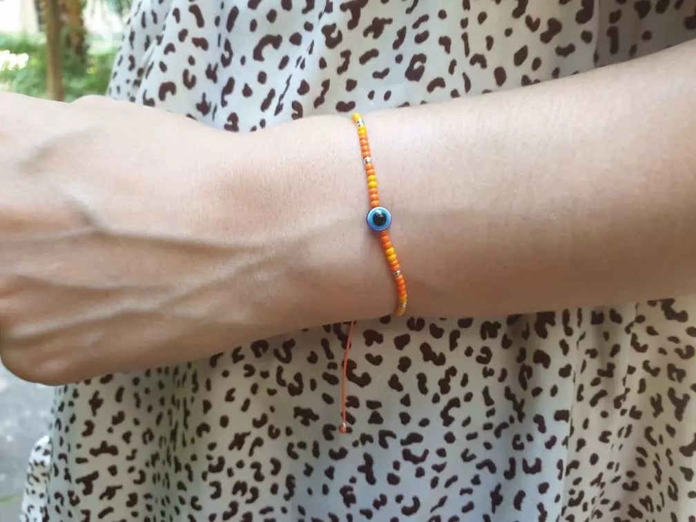 Bracelet Perles Rocailles Oranges et Œil Protecteur  Bracelet Jethyka