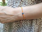 Bracelet Perles Rocailles Oranges et Œil Protecteur  Bracelet Jethyka