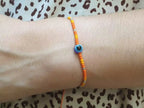 Bracelet Perles Rocailles Oranges et Œil Protecteur  Bracelet Jethyka
