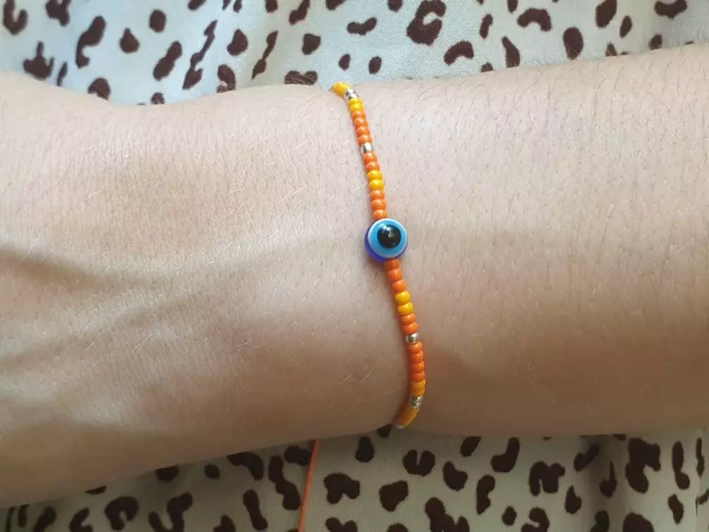 Bracelet Perles Rocailles Oranges et Œil Protecteur  Bracelet Jethyka