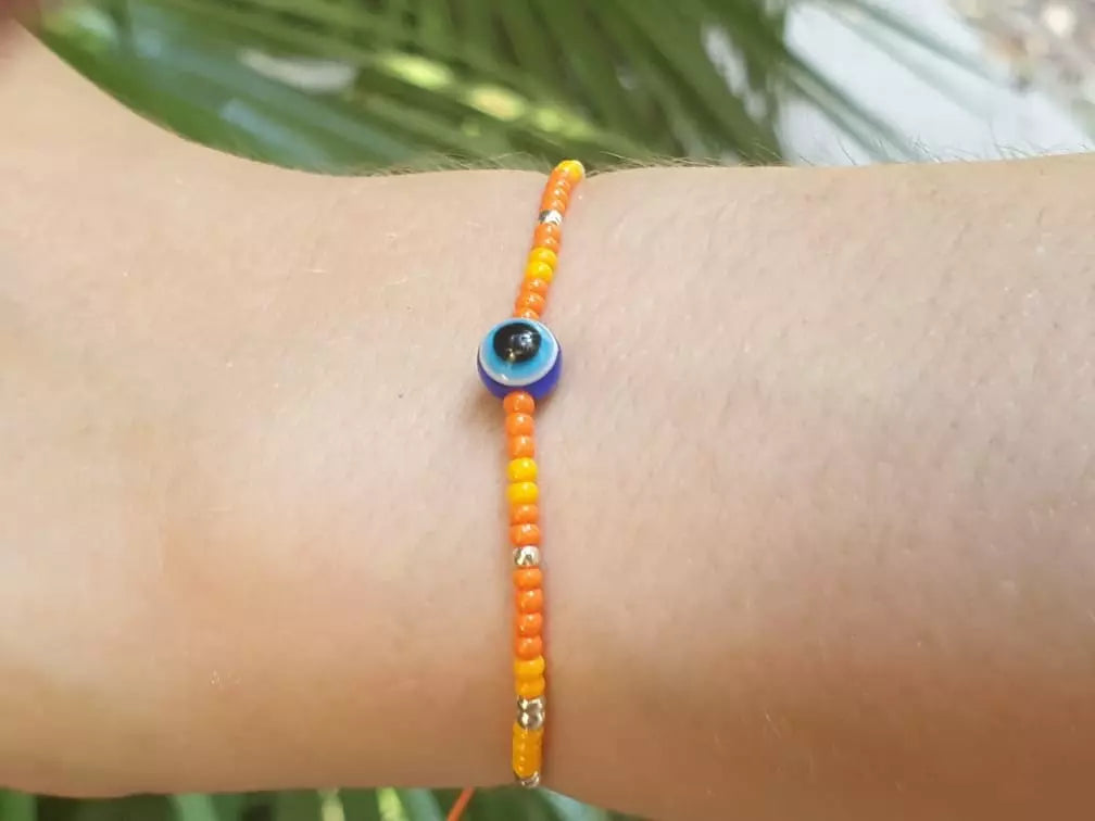 Bracelet Perles Rocailles Oranges et Œil Protecteur  Bracelet Jethyka