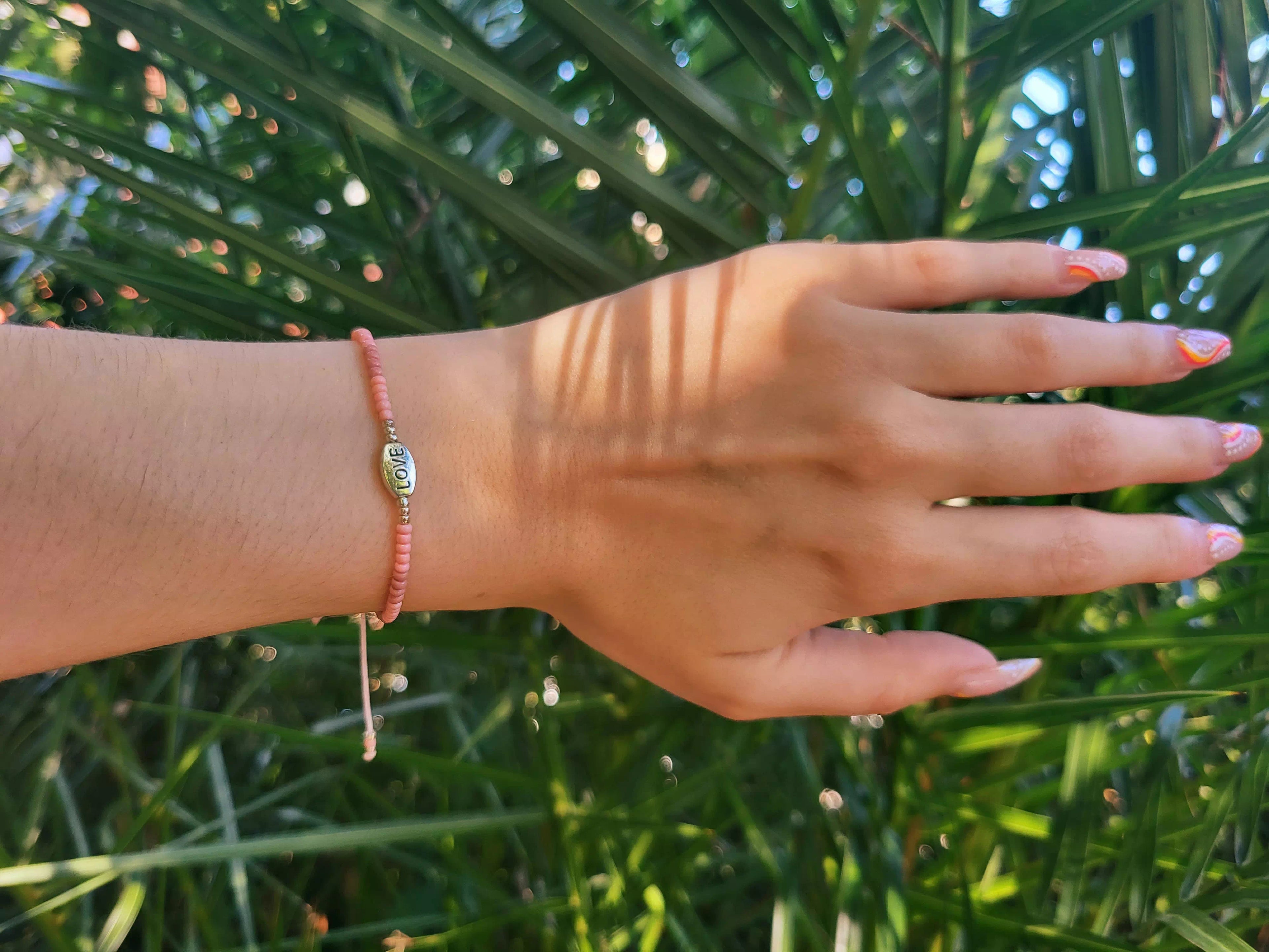 Bracelet Love perles rocailles roses  Bracelet Jethyka