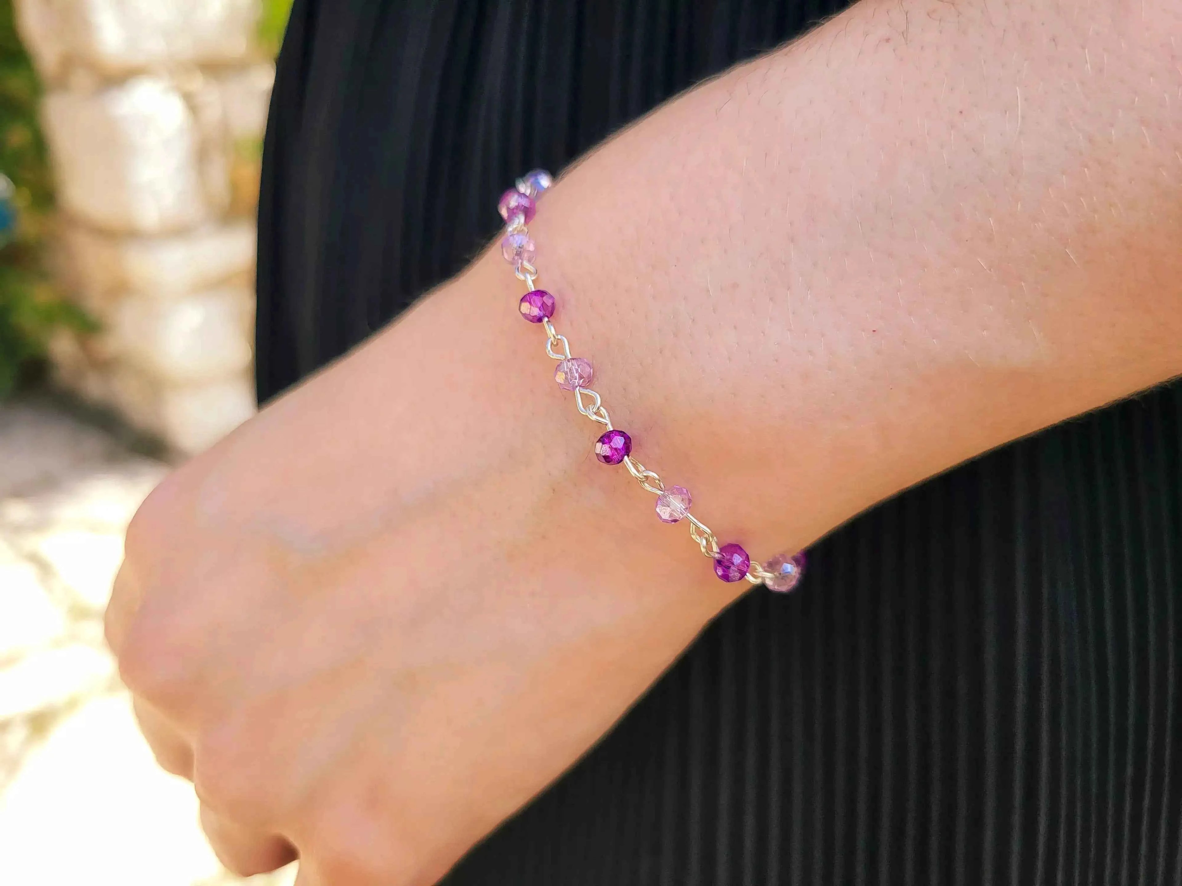 Bracelet perles cristal violettes et Parmes