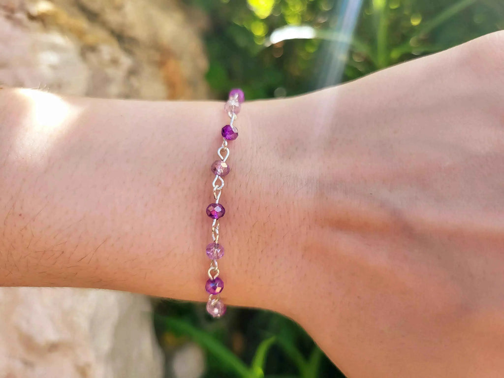 Bracelet perles cristal violettes et Parmes
