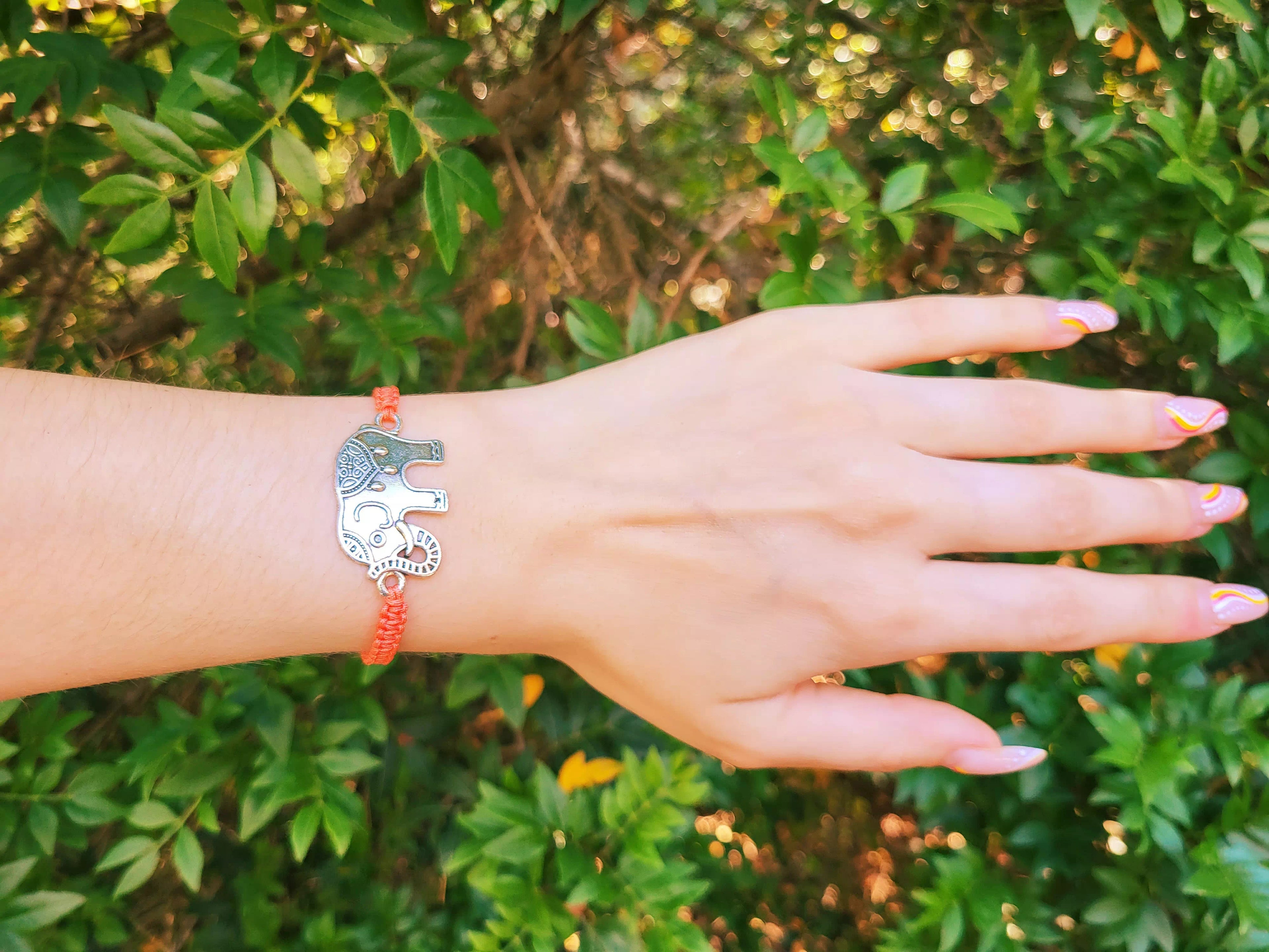 Bracelet Macramé Orange et Eléphant argenté  Bracelet Jethyka