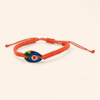 Bracelet macramé orange avec coquillage cauri coloré  Bracelet Jethyka