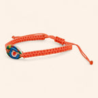 Bracelet macramé orange avec coquillage cauri coloré  Bracelet Jethyka