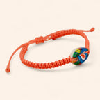 Bracelet macramé orange avec coquillage cauri coloré  Bracelet Jethyka