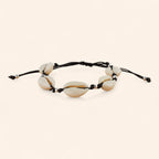 Bracelet noir avec coquillages cauris et perles en métal argenté  Bracelet Jethyka