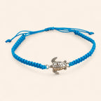 Bracelet Tortue Argentée en Macramé Bleu  Bracelet Jethyka