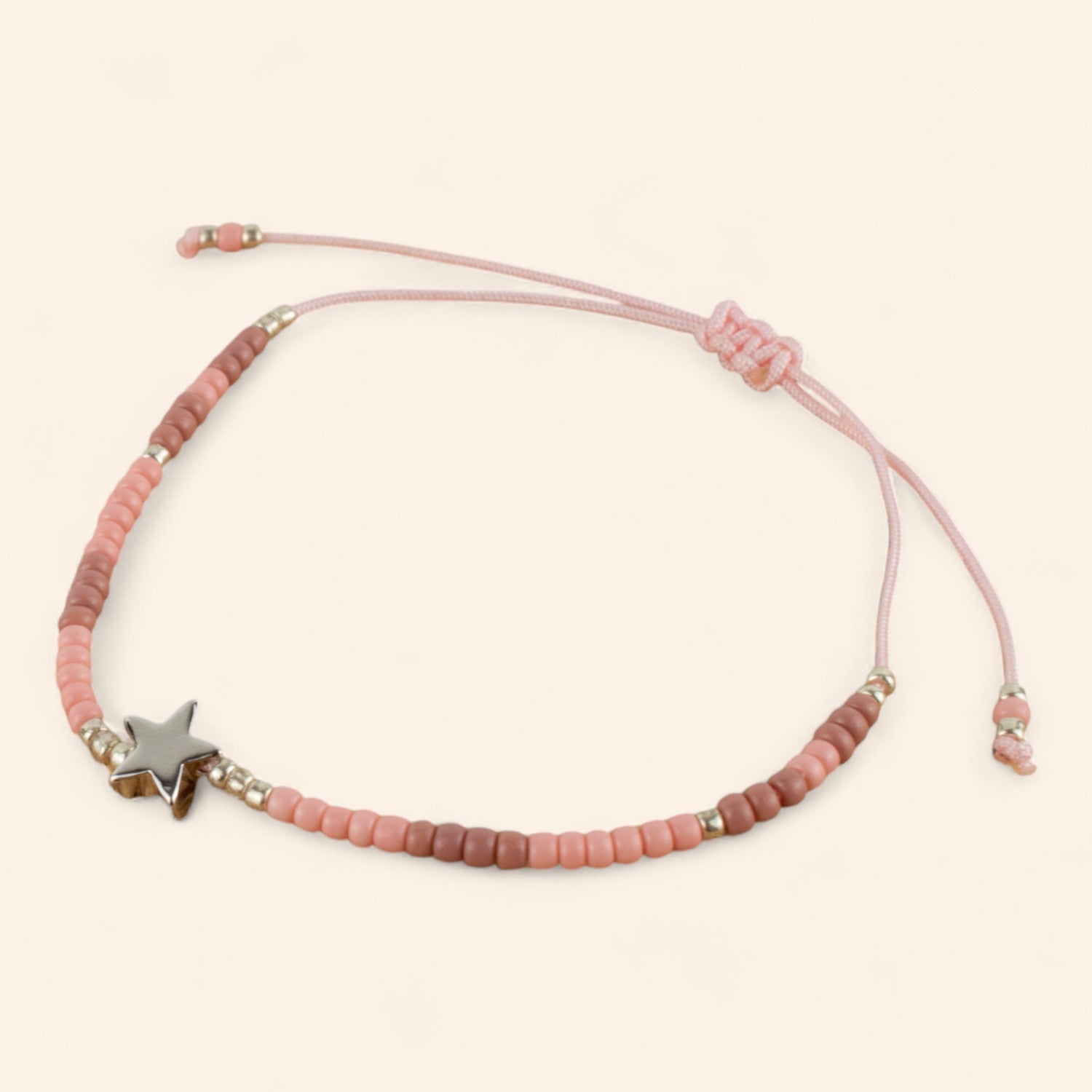 Bracelet étoile argentée et perles rocailles roses  Bracelet Jethyka