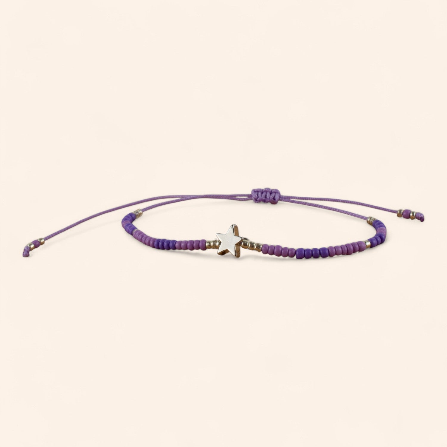 Bracelet perles rocailles violettes et perle étoile en métal argenté  Bracelet Jethyka